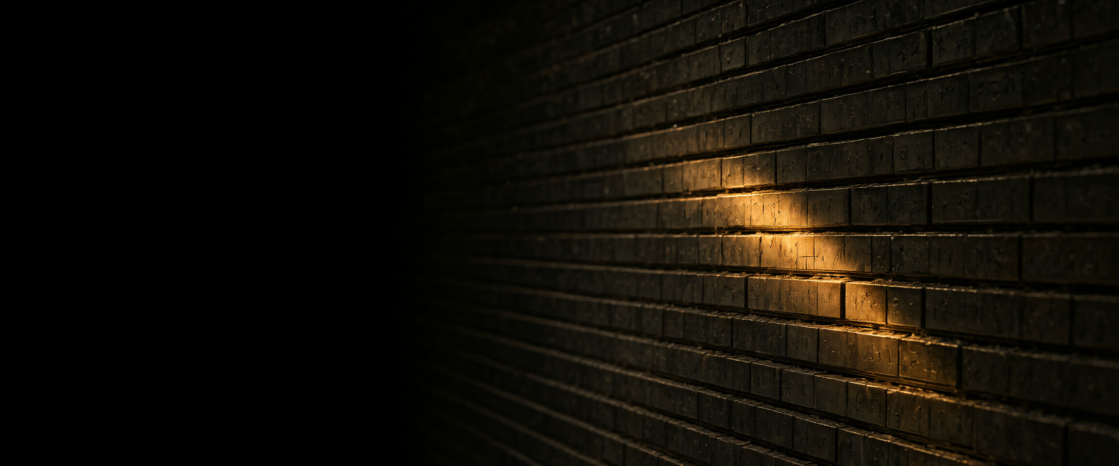 A monumental archive of dark metal plates receding into blackness, lit by a single warm amber light